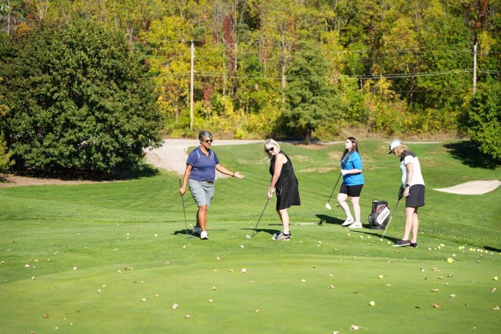 Women hitting balls at a Smashing Nines clinic at Dundas Valley