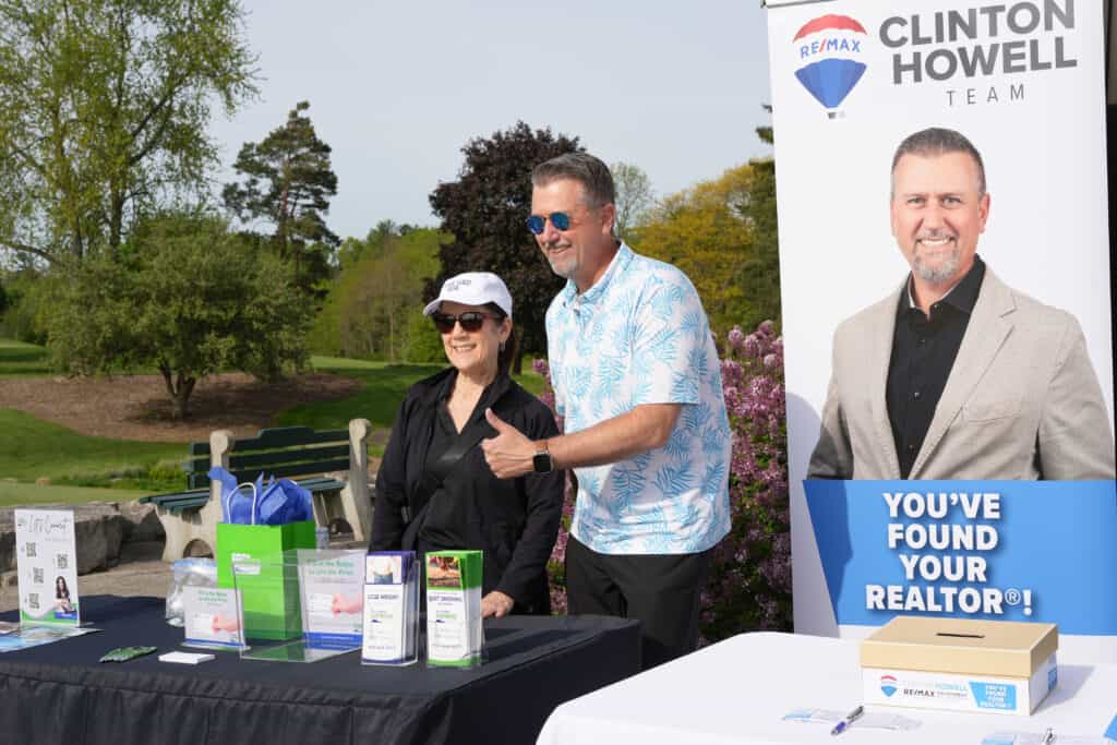 Sponsors at the Clinton Howell RE/MAX booth at Smashing Nines